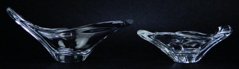 2 DAUM CRYSTAL CANDY BOWLS: 2 DAUM CRYSTAL CANDY BOWLS largest measures 9.5" long free form shape signed to base Daum France excellent condition