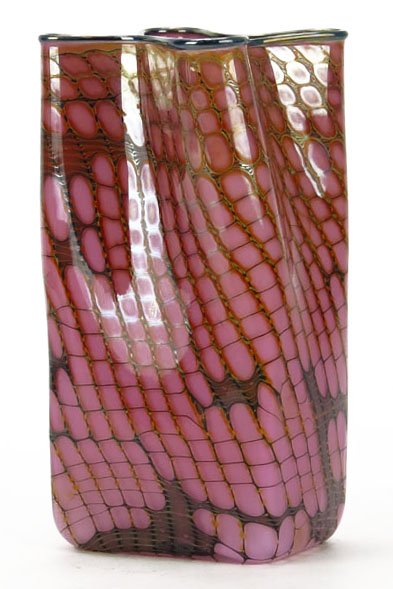 1983 BLOWN ART GLASS SIGNED STUDIO VASE. Signed Under: 1983 BLOWN ART GLASS SIGNED STUDIO VASE. Signed Under Base. Measures Approximately 8" Tall. In a Pink Cased Glass Quilted Pattern. Shipping $36.00