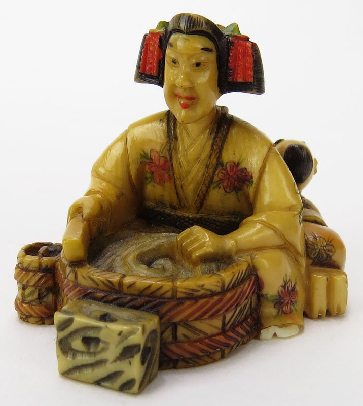 Japanese Carved Ivory Netsuke. Signed. Hand Painted. Th: Japanese Carved Ivory Netsuke. Signed. Hand Painted. This item will only be shipped domestically and was legally imported into the United States. Shipping to California is Not Available for this Lot. 