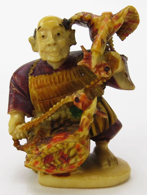 Japanese Carved Ivory Netsuke. Signed. Hand Painted. T: Japanese Carved Ivory Netsuke. Signed. Hand Painted. This item will only be shipped domestically and was legally imported into the United States. Shipping to California is Not Available for this Lot. 