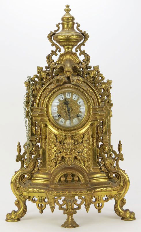 French Bronze Clock, with Original Key. Very Good: French Bronze Clock, with Original Key. Very Good Condition. Measures 24 Inches Tall by 13 Inches Wide. Shipping $120.00