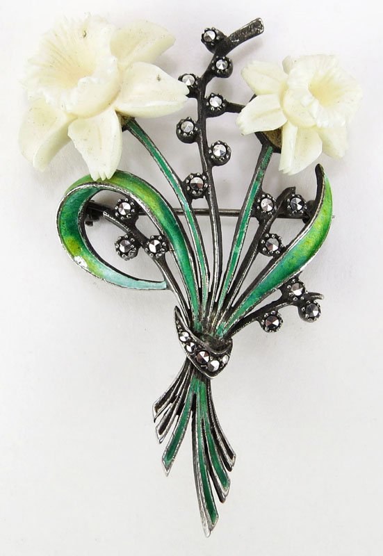 Early to Mid 20th Century European Made Enamel Ivory: Early to Mid 20th Century European Made Enamel Ivory and Marcasite Flower Pin. Minor Wear from Age or else Good Condition. Measures almost 2-3/4 Inches Long. This item will only be shipped domesticall