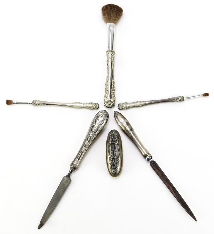 Gorham Sterling Handled Letter Opener, Gorham Sterling: Gorham Sterling Handled Letter Opener, Gorham Sterling Handled Nail File, Sterling Silver Nail Buffer and Three (3) Silverplate Brushes. Shipping $25.00