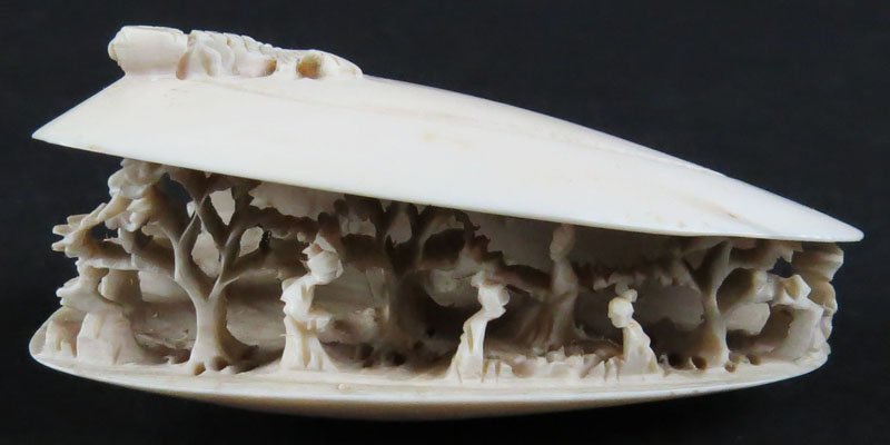 Chinese Carved Ivory Miniature Clam Shell "Village": Chinese Carved Ivory Miniature Clam Shell "Village" with Fish on Top Mounted on Wooden Base. Good Condition. Measures 5 Inches Tall and 13 Inches Wide with Base. This item will only be shipped domesti