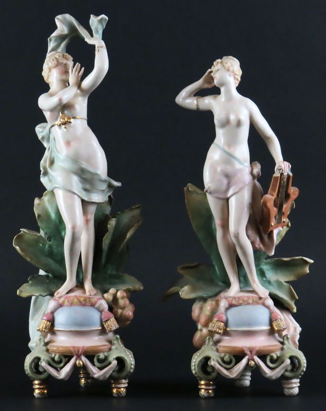 Two (2) Amphora Art Nouveau Porcelain Figures of: Two (2) Amphora Art Nouveau Porcelain Figures of Females. One with Repair and Losses to Both. Stamped with Numerals Only. Taller Measures 15 Inches. Shipping $45.00