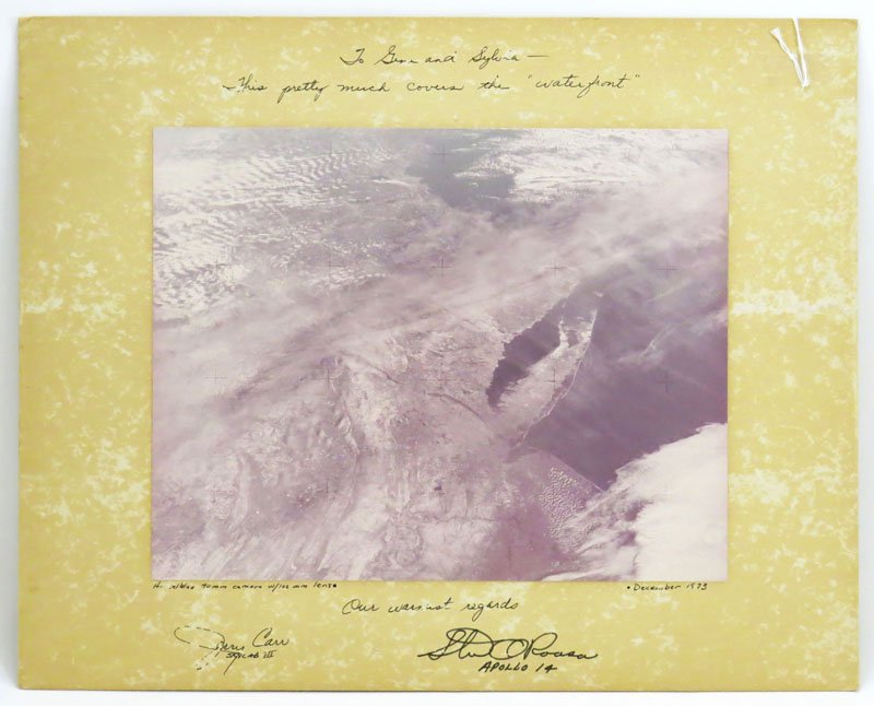 Photograph Taken from NASA Skylab III Signed Skylab: Photograph Taken from NASA Skylab III Signed Skylab Astronaut Jerry Carr and Apollo 14 Astronaut Stuart Roosa. Mounted on Heavy Stock. Dated December 1973. Overall Measures 16 Inches by 20 Inches. Shi
