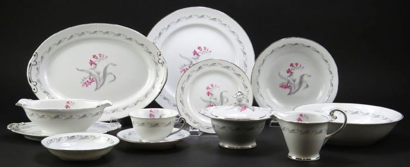 Seventy Four (74) Piece Elain Porcelain Dinner Service: Seventy Four (74) Piece Elain Porcelain Dinner Service Japan. Service Includes: 12 Dinner Plates, 11 Salad Plates, 11 Bread Plates, 6 Fruit Dishes, 11 Soup Bowls, 6 Cups and 11 Saucers. Serving Pieces