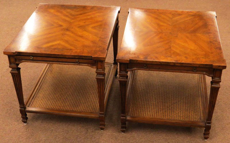 Pair of Heritage Side Tables with Burlwood Tops, Wicker: Pair of Heritage Side Tables with Burlwood Tops, Wicker Shelves and Pull Out Writing Shelves. Good Condition. Signed. Measures 22-1/2 Inches Tall and 23 Inches Wide. We Will Not Ship This Item Due to