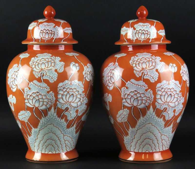Pair of Andrea Coral and White Ginger Jars. Orande and: Pair of Andrea Coral and White Ginger Jars. Orande and Floral Design. Good Condition. Measures: 14-1/2 Inches Tall. Shipping $100.00