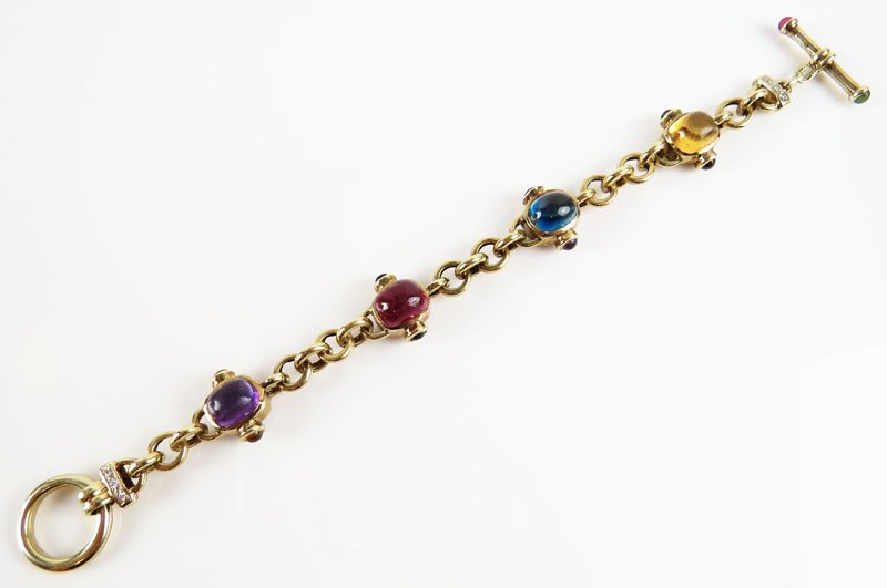 Lady's 14 Karat Yellow Gold, Diamond and Colored Stone: Lady's 14 Karat Yellow Gold, Diamond and Colored Stone Bracelet. Stamped 14KT. Good Condition. Measures 8 Inches Long. Weighs:19.5 Pennyweight. Shipping $28.00