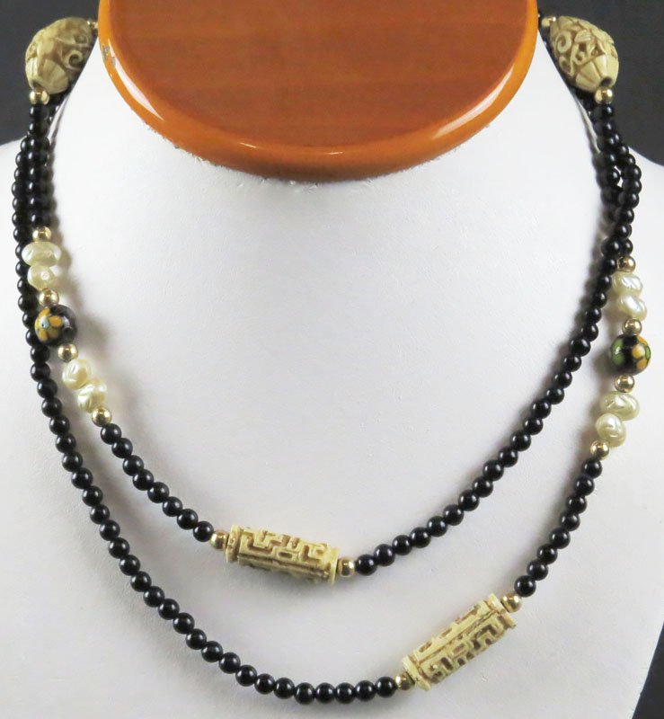 1/20 12 Karat Gold Filled Necklace with Black Jet: 1/20 12 Karat Gold Filled Necklace with Black Jet Beads, Bone and Mother of Pearl/Abalone Spacers and CloisonnÃ© Beaded Necklace. Good Condition. Signed. Measures 32 Inches. Shipping $20.00