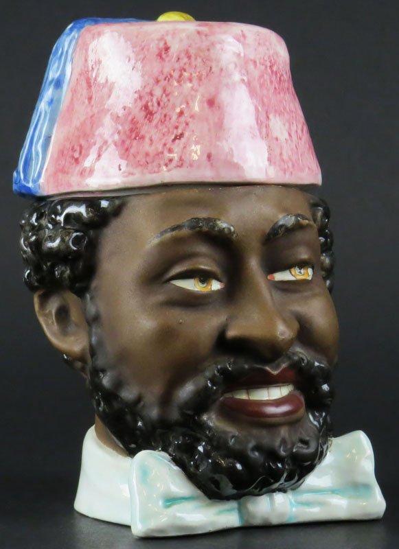 Vintage/Antique Figural Porcelain Tobacco Jar Humidor: Vintage/Antique Figural Porcelain Tobacco Jar Humidor "Black Man with Hat and Bowtie" Rubbing and a Small Chip to Side of Hat or else Good Condition. Measures 7 Inches Tall. Shipping $32.00