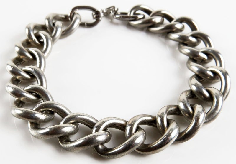 Sterling Silver Cuban Link Style Bracelet. Signed: Sterling Silver Cuban Link Style Bracelet. Signed Sterling and Makers Mark. Good Condition. Weighs 1.71 Troy Ounces. Measures 7 Inches Long. Shipping $20.00