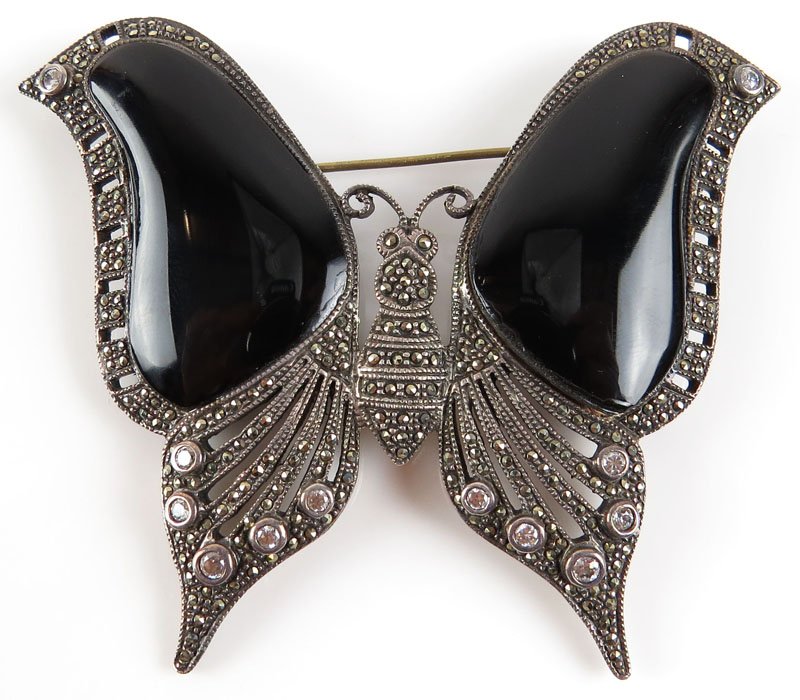 Vintage Oversized Sterling Silver, Marcasite, Diamond: Vintage Oversized Sterling Silver, Marcasite, Diamond and Black Onyx Butterfly Pin. Unsigned. Good Condition. Gross Weighs 1.50 Troy Ounces. Measures 3 Inches by 3-5/8 Inches. Shipping $20.00