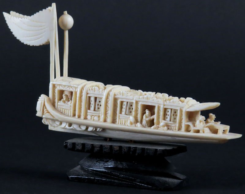Chinese Miniature Carved Ivory Boat Wooden Stand.: Chinese Miniature Carved Ivory Boat Wooden Stand. Measures 5 Inches Long. This item will only be shipped domestically and was legally imported into the United States. Shipping to California is Not Ava