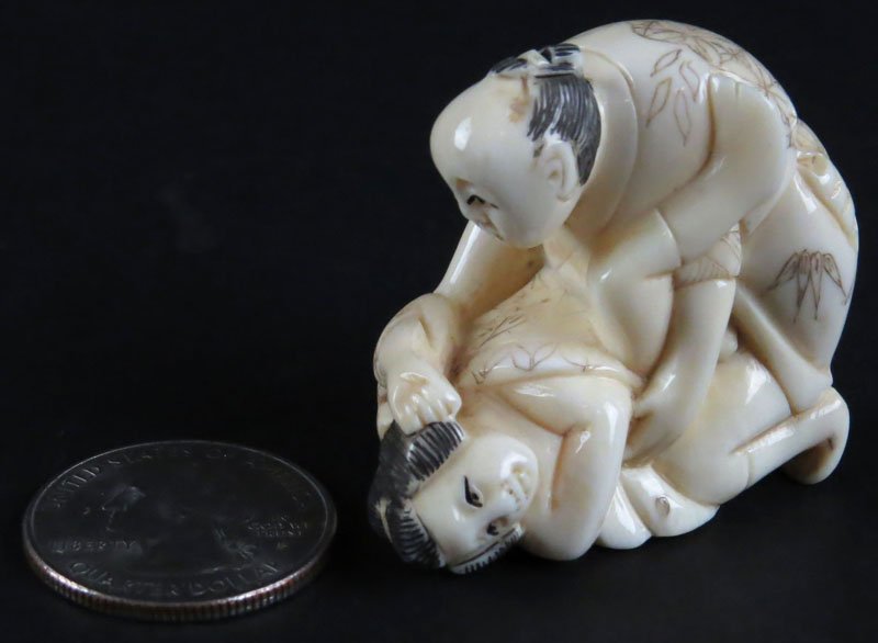 Japanese Carved Ivory Erotic Couple Netsuke. Signed.: Japanese Carved Ivory Erotic Couple Netsuke. Signed. Good Condition. This item will only be shipped domestically and was legally imported into the United States. Shipping to California is Not Availabl