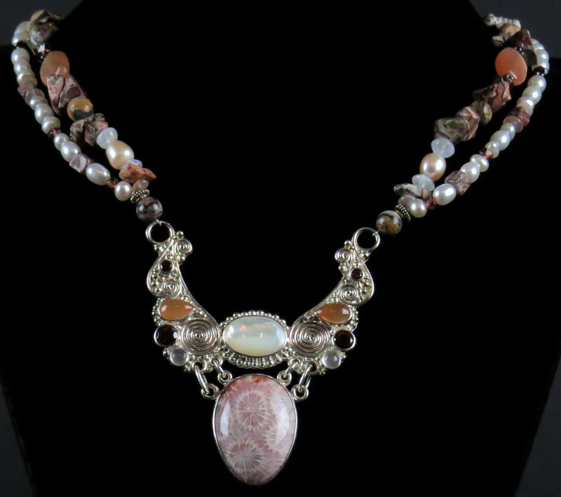 Sajan Sterling Silver Pearl, Garnet, Agate, Moonstone,: Sajan Sterling Silver Pearl, Garnet, Agate, Moonstone, Jasper, Glass, Fossil and Rhodonite Ladies Necklace. Signed. Good Condition. Measures 24 Inches. Shipping $20.00