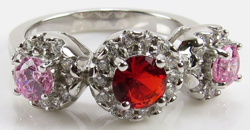 2.00 Carat Ruby, Pink Sapphire and White Topaz Sterling: 2.00 Carat Ruby, Pink Sapphire and White Topaz Sterling Silver Ladies Ring, Size 7. Signed 925. Good Condition. Weighs 0.15 Troy Ounces. Shipping $20.00