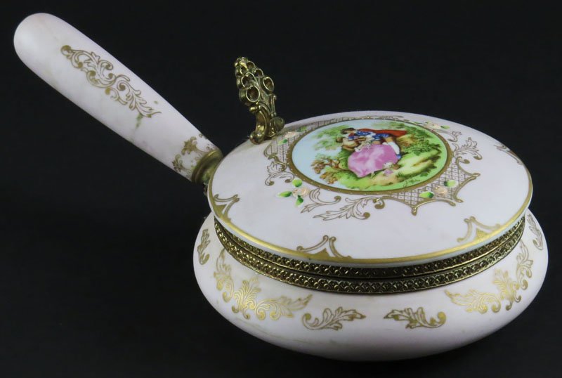 Isco Japan Porcelain Silent Butler with Brass Mountings: Isco Japan Porcelain Silent Butler with Brass Mountings and French Decoration. Signed. Good Condition. Measures 3-1/4 Inches Tall and 10-1/4 Inches Long. Shipping $20.00