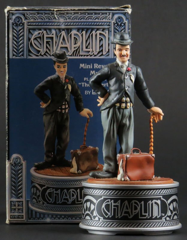Enesco Mini Revolving Charlie Chaplin Musical. Plays: Enesco Mini Revolving Charlie Chaplin Musical. Plays the Tune "The Entertainer" in Original Box. Very Good Condition. Plays. Measures 5-1/2 Inches Tall. Shipping $20.00