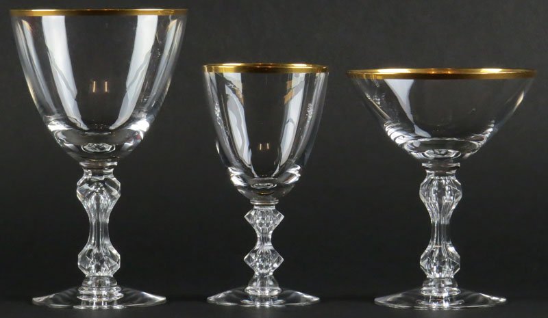 Forty One (41) Piece Crystal Stemware Service with Gilt: Forty One (41) Piece Crystal Stemware Service with Gilt Trim. Unsigned. Service Includes: 12 Water Goblets, 12 Martini Glasses and 17 White Wine Glasses. Good Condition, Very Light Wear. Shipping $150