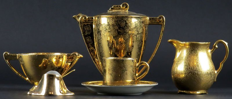 Twenty Six (26) Piece Partial Gilt Porcelain Tea: Twenty Six (26) Piece Partial Gilt Porcelain Tea Service together with Eleven (11) Gilt Porcelain Salt Cellars with Spoons. Partial Gilt Porcelain Demitasse Tea Set. Includes Six (6) Cups with Saucers