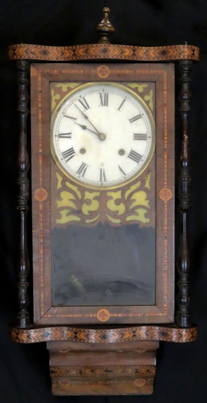 Antique Inlay Wall Clock. No Pendulum no Key. Appears: Antique Inlay Wall Clock. No Pendulum no Key. Appears to Run. Missing Some Finials. Some Scratching. Good Condition. Measures 32 Inches Tall 15-1/4 Inches Wide. Shipping $125.00.