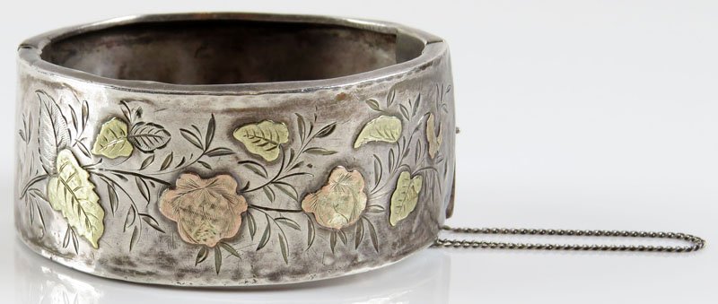 Early 20th Century Continental Standard Silver Ladies: Early 20th Century Continental Standard Silver Ladies Bangle Bracelet with Vermeil Decoration and Safety Chain. Probably WWI Period. Signed Standard Silver. Small Size. A few Minor Pings and Dings or 