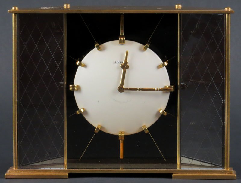 LeCoultre Desk Clock. Dial Signed LeCoultre. Good: LeCoultre Desk Clock. Dial Signed LeCoultre. Good Condition and Working Order. Measures 6 Inches Tall and almost 8 Inches Wide. Shipping $20.00