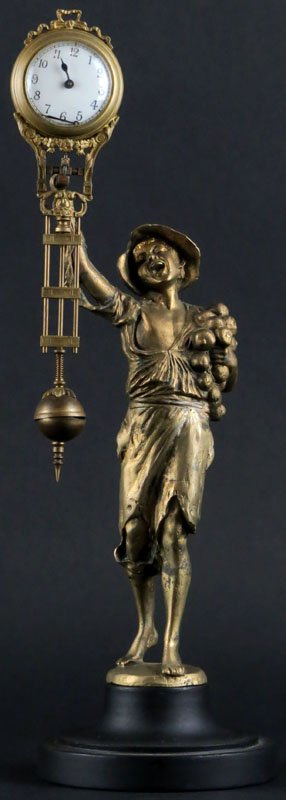 Miniature Antique French Metal Swinger Clock. Clock Not: Miniature Antique French Metal Swinger Clock. Clock Not Running. Unsigned. Rough Finish. 15 Inches Tall. Shipping $30.00