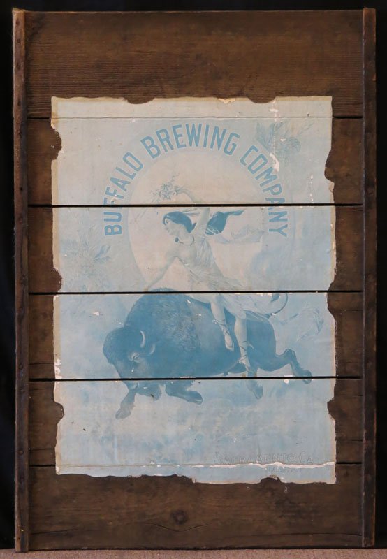 Buffalo Brewing Company Poster on Antique Raisin Drying: Buffalo Brewing Company Poster on Antique Raisin Drying Rack. Includes Descriptive Tag on Back. Unsigned. Tears to Poster. Good Condition. Measures 36 Inches Tall 34 Inches Wide. We Will Not Ship This