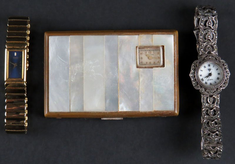 Sterling Silver and Marcasite Ladies Watch with Quartz: Sterling Silver and Marcasite Ladies Watch with Quartz Movement together with Rockford Compact Clock and a Ladies Seiko Quartz Watch. None of the Watch Movements in Working Condition. Shipping $20.00