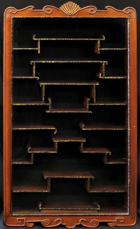 Asian-Style Wall Display Cabinet with Glass Front. Key: Asian-Style Wall Display Cabinet with Glass Front. Key Attached. Unsigned. Minor Scratching or Else Good Condition. Measures 34 Inches Tall and 19-3/4 Inches Wide. We will not ship this item due to it