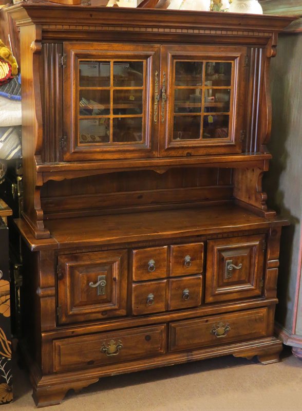 Large Two (2) Piece Carved Pine Hutch with Glass Doors.: Large Two (2) Piece Carved Pine Hutch with Glass Doors. Original Hardware. Measures 75 Inches Tall and 57 Inches Wide. We Will Not Ship This Item In-House Due to Its Size, But Would be Happy to Recomm