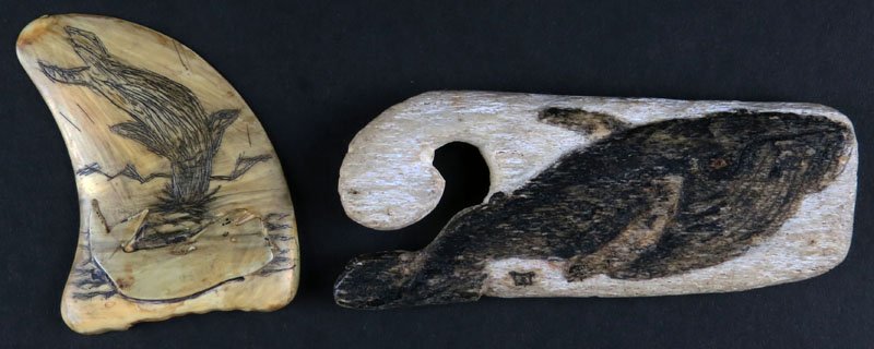 Antique Painted and Carved Wooden Inuit Eskimo Sperm: Antique Painted and Carved Wooden Inuit Eskimo Sperm Whale together with what appears to be a Resin or Wooden Scrimshawed Seal and Whale Tooth Shaped Item. Signed. Wood Looks Fossilized. Measures 4 In