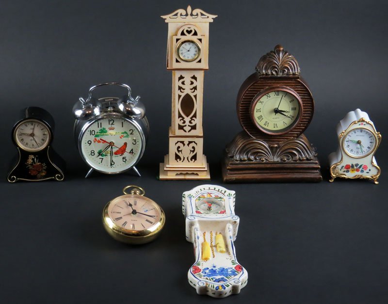 Four (4) Assorted Quartz Clocks. Signed. Clocks May not: Four (4) Assorted Quartz Clocks. Signed. Clocks May not Run. Some Scratching to Brass Clock and Staining to Porcelain Clock or else Good Condition. Together with Three (3) Other Clocks. One Signed "Bu