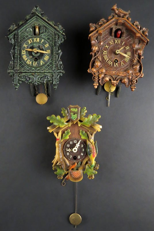 Two (2) Miniature The Lux Company Wooden Bird House: Two (2) Miniature The Lux Company Wooden Bird House Clocks. Signed "Lux USA". Clocks do not Run. Some Rusting to Movement Case or else Good Condition. Together with Miniature German Wooden Birdhouse C