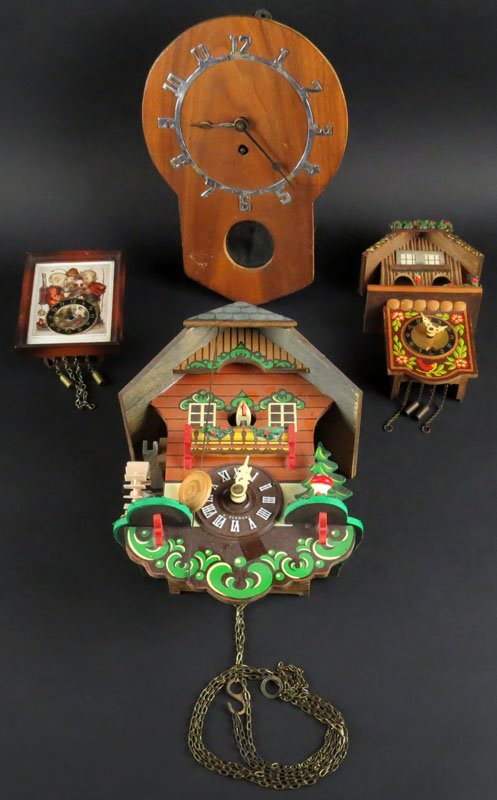 Two (2) German Decorative Birdhouse Clocks. Together: Two (2) German Decorative Birdhouse Clocks. Together with Two (2) Other Clocks. Some Signed. Clocks May not Run or else Good Condition. Largest Clock Measures 9-1/4 Inches Tall and 6-1/2 Inches Wide. 
