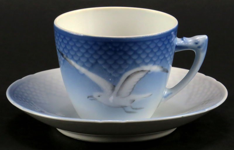 Eight (8) Bing and Grondahl Royal Copenhagen Denmark: Eight (8) Bing and Grondahl Royal Copenhagen Denmark Porcelain Tea Cups together with Six (6) Matching Saucers with NO Gilt Trim in the Seagull Pattern. Signed. Good Condition. Tea Cup Measures 2-1/2 
