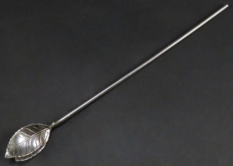 Tiffany and Company Sterling Silver Ice Tea Straw with: Tiffany and Company Sterling Silver Ice Tea Straw with Leaf Spoon. Signed Tiffany & Co., Sterling. Weighs 8.00 Pennyweights. Shipping $20.00