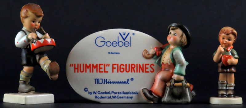 Collection of Three (3) Hummel Goebel Porcelain: Collection of Three (3) Hummel Goebel Porcelain Figures. #187 A Merry Wanderer Dealer Advertising Display, #2050 B Be Mine, and #240 Little Drummer Boy. Signed. Largest Figure Measures 3-1/2 Inches Ta