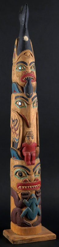 Skagway Alaska Bobbi and Nate Painted and Carved Wooden: Skagway Alaska Bobbi and Nate Painted and Carved Wooden Totem. Looks Like a Spot Broken Off Above Top Head or else Good Condition. Has Info Under Base. Measures 28 Inches Tall and Base Measures 5-1/2 
