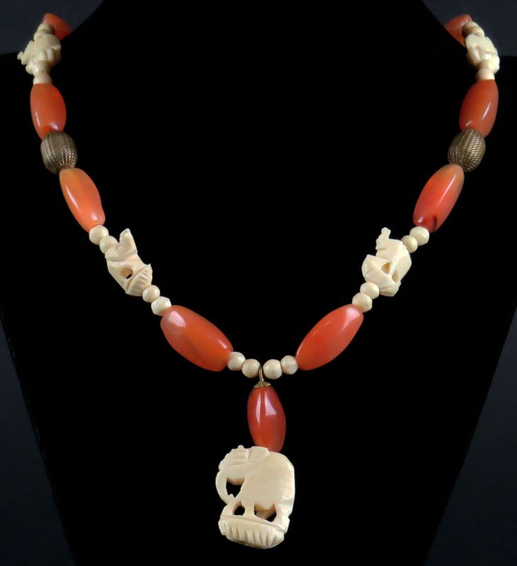 Carved Ivory and Carnelian Necklace. Good Condition.: Carved Ivory and Carnelian Necklace. Good Condition. Measures 22-1/2 Inches Long. This item will only be shipped domestically and was legally imported into the United States. Shipping to California is