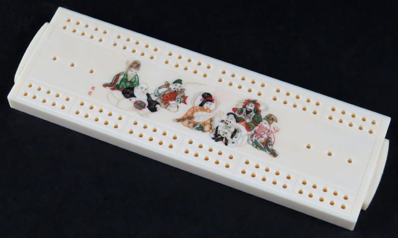 Chinese Carved Ivory Cribbage Game. Pegs Inserted on: Chinese Carved Ivory Cribbage Game. Pegs Inserted on Ends. Signed. Very Good Condition. Measures 6-3/8 Inches Long and 2 Inches Wide. This item will only be shipped domestically and was legally import