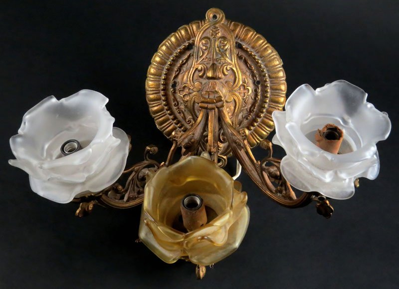 Gilt Metal Three (3) Light Sconce with Glass Shades.: Gilt Metal Three (3) Light Sconce with Glass Shades. Needs Wiring Work or else Good Condition. Unsigned. Measures 10 Inches Tall and 13 Inches Wide. Shipping $70.00