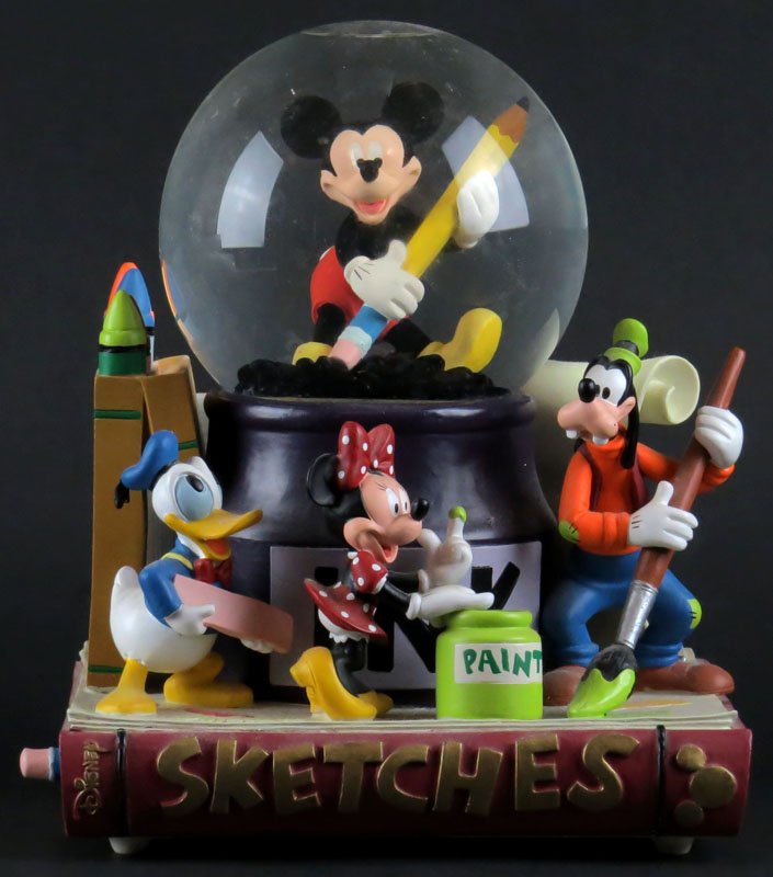 Disney "Sketches" Musical Snow Globe. Music Plays: Disney "Sketches" Musical Snow Globe. Music Plays Mickey Mouse Club March. Unsigned. Measures 9 Inches Tall and 7 Inches Wide. Shipping $40.00