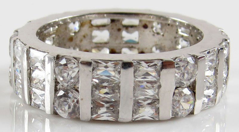 CZ and Sterling Silver Eternity Band Ring. Ring Size 7.: CZ and Sterling Silver Eternity Band Ring. Ring Size 7. Stamped 925 and China. Good Condition. Gross Weighs 3.90 Pennyweights. Shipping $20.00