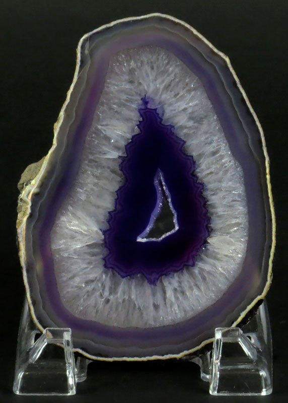 Sliced and Polished Purple Amethyst Geode Cross: Sliced and Polished Purple Amethyst Geode Cross Section. Generally Good Condition. Measures 6 Inches by 4-1/4 Inches. Shipping $20.00
