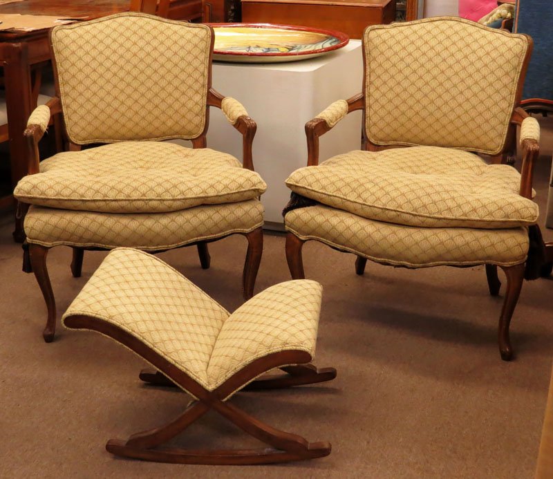 Pair of Mid Century French Provincial Style Upholstered: Pair of Mid Century French Provincial Style Upholstered Armchairs with Footstool. Unsigned. Good Condition. Measures 33 Inches Tall and 26 Inches Wide. We will not ship this item due to its size. We w