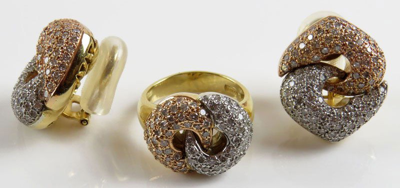 Chimento Italian 18 Karat Pink and Yellow Gold Diamond: Chimento Italian 18 Karat Pink and Yellow Gold Diamond Mounted Love Knot Suite Including: Ring and Pair of Earrings. Each Signed. Good Condition. Gross Weighs 22.40 Pennyweights. Shipping $20.00